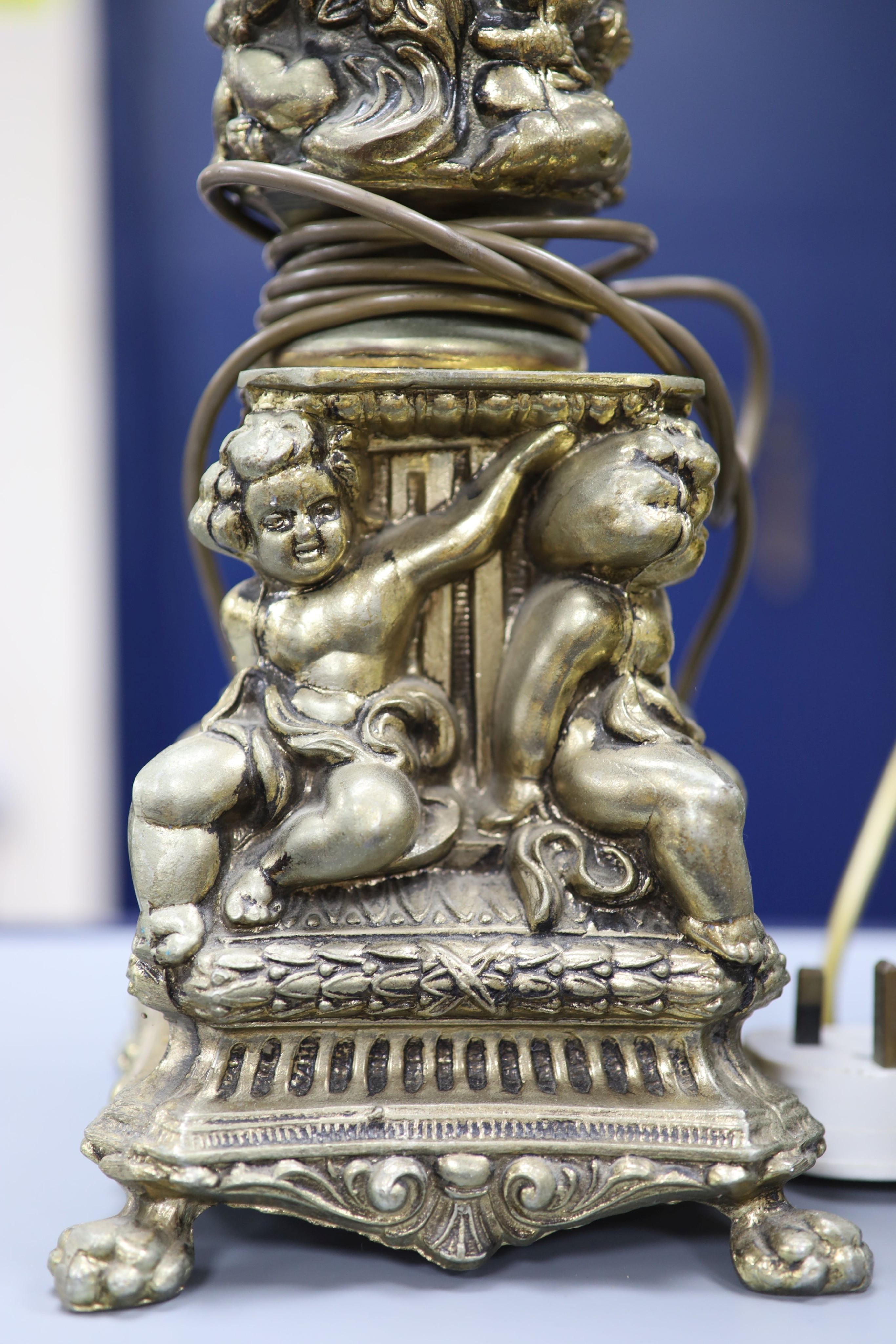 A pair of gilt metal column lamp bases, total height 61 cm
